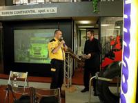 Giving autographs at BARUM CONTINENTAL spol. s r.o. stand